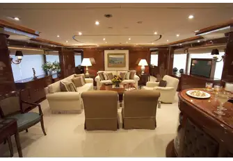 Looking forward in the main saloon with bar and lounge seating