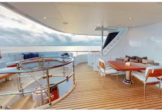 Lounge and intimate dining on the bridge deck aft