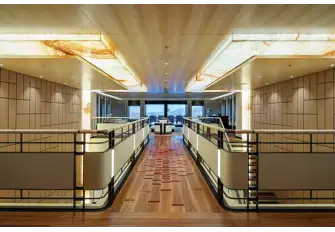Looking aft on the upper deck past the two atriums