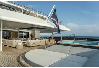 Large pool and lounge on the main deck aft