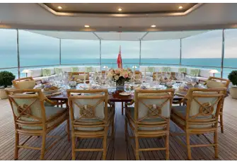 Open air dining on the upper deck aft