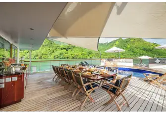 Open air dining and a large pool