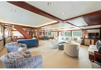 The Great Room with formal dining and sit-up bar forward and lounge areas aft