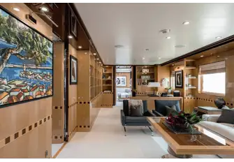 The large lounge and office at the entrance to the owner's suite