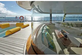 The aft cockpit can be closed off with sliding curved glass panels for climate control
