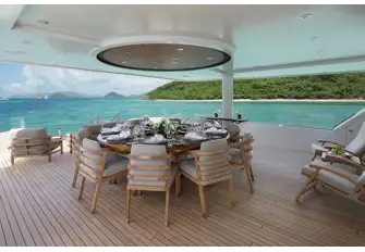 The bridge deck aft has open air dining and a lounge area with infinity views through glass guardrails