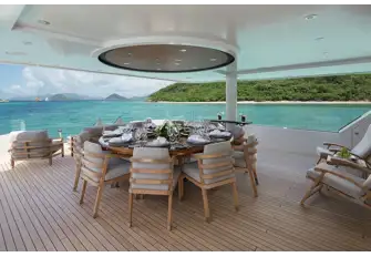 The bridge deck aft has open air dining and a lounge area with infinity views through glass guardrails