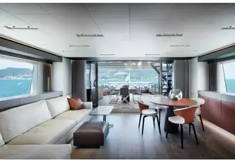 Looking aft in the sky lounge, out to the al fresco dining on the bridge deck aft