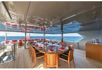 Open air dining on the upper deck aft