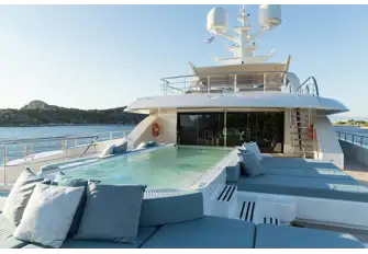The large glass fronted pool on the bridge deck aft overlooked by a dedicated gym inside