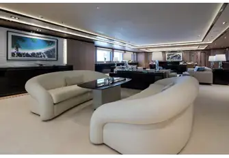 Looking forward in the main saloon across a cosy lounge, larger lounge and formal dining forward