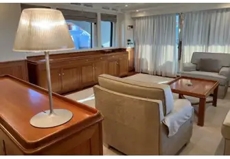 The bright and airy saloon, with its spacious, restful design by Alessandra Negrato, is aft of the formal dining area