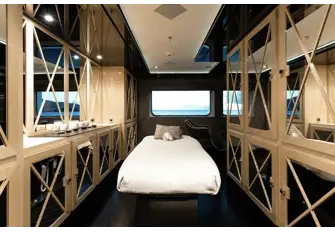 Her main deck spa area has a massage table as well as a hair and beauty salon
