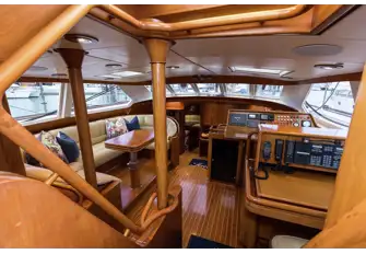The deck saloon has dining to port and nav station and chart table to starboard, with great all-round views