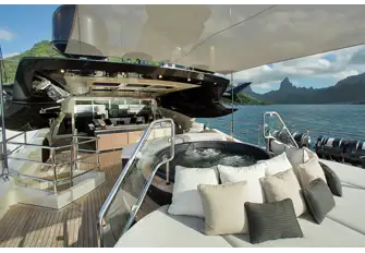 Take a dip in the jacuzzi or catch a movie together in the sun deck lounge