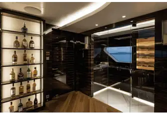 The clubroom's wine cellar and humidor, enjoy your cigar on the aft terrace