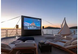 An outdoor cinema screen delivers movies under the stars