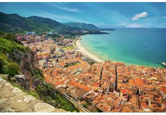 Looking west along Cefalu beach from the cliffs overlooking the town