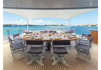 Open air dining on the upper deck aft