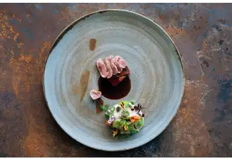 Plated to look as though it is served on a seabed