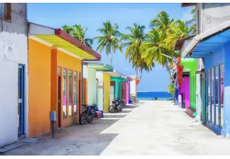 Behind the exquisite resorts, local towns are bright and bustling