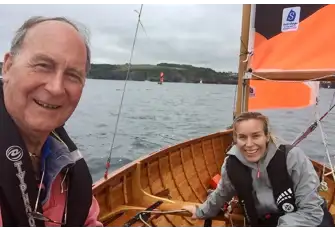 Still messing about in small boats with her dad!