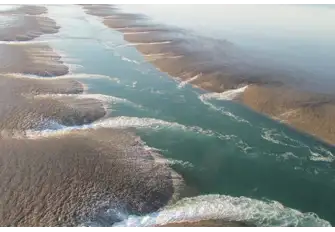 The falling tide reveals Montgomery Reef in the Kimberleys, Western Australia