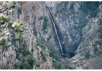 This waterfall cascades into a deep pool - dive in to cool off