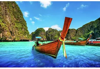 One of Thailand's coastal signatures is the longtail boat, like this one in Maya Bay on Phi Phi Leh