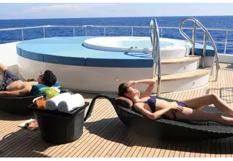 SUNONE - The raised jacuzzi and sun lounging space aft on the sun deck