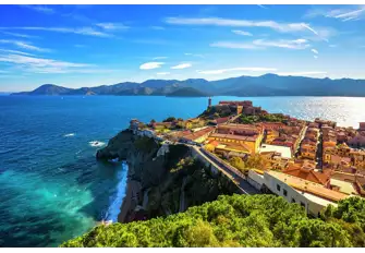Elba's capital, the historic fortified town of Portoferraio, with the hills of Tuscany in the background