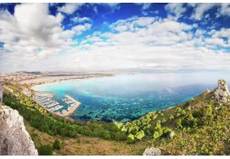 Looking northeast over Cagliari's Marina Piccola and Sella del Diavolo, the Devil's Saddle