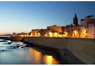 Bastion Marco Polo lit up at night with the 16th century Cattedrale dell’Immacolata Concezione
