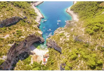 The secret cove enveloping Stiniva beach on Vis Island