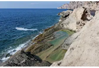 The quarry at Atlantis creates wonderful sea pools, perfect for a dip mid-hike