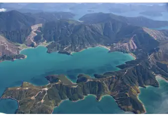 South Islands' Marlborough Sounds are home to prestigious vineyards and mussel farms