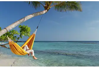 After a visit to Fonimagoodhoo's verdant interior, relax and take in the view