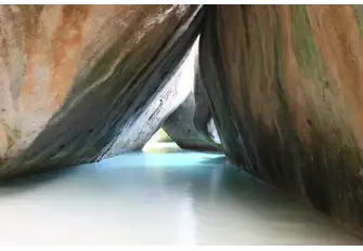 Majestic spaces formed by The Baths' smooth granite rocks