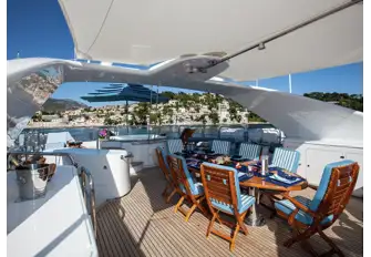 Open air dining with BBQ and optional shade from removable awnings